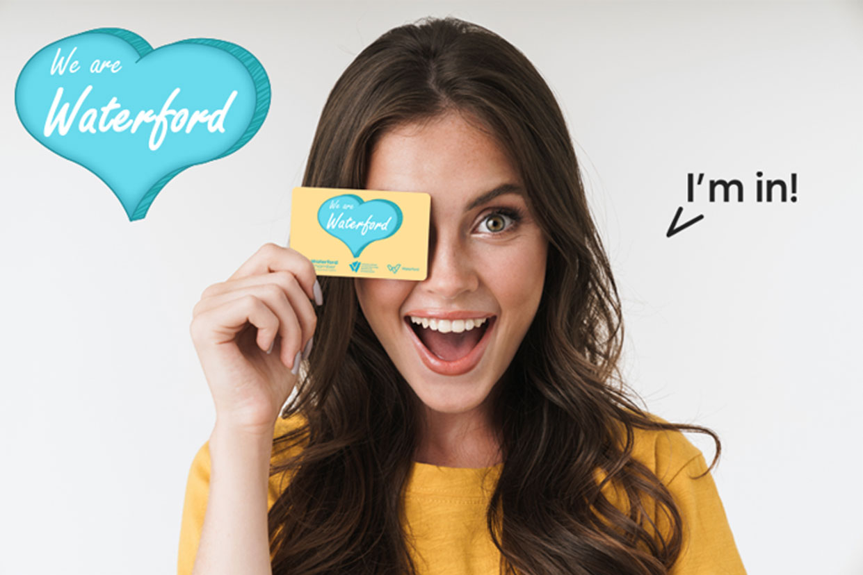 Image of holding the We Are Waterford Card